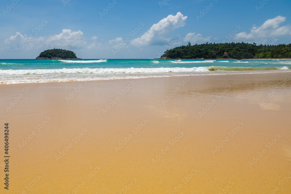 Beautiful sea Sunny landscape on the beach. Light waves of blue color spread all over the beach smoothly smoothing the Golden sand. Beautiful sea Sunny landscape on the beach. Light waves of blue color spread all over the beach smoothly smoothing the Golden sand.