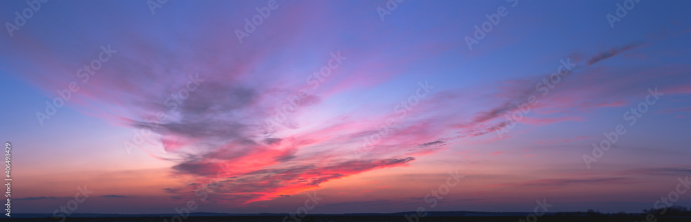 Colorful sky with red clouds after sunset