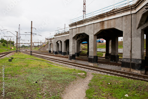 Railroad rails passing under the bridge