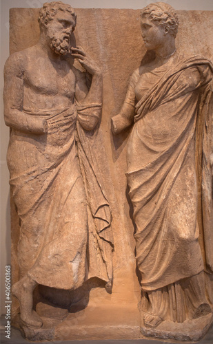 Fotografie Ancient bas-relief on funerary stele from Kerameikos in Athens, Greece depicting