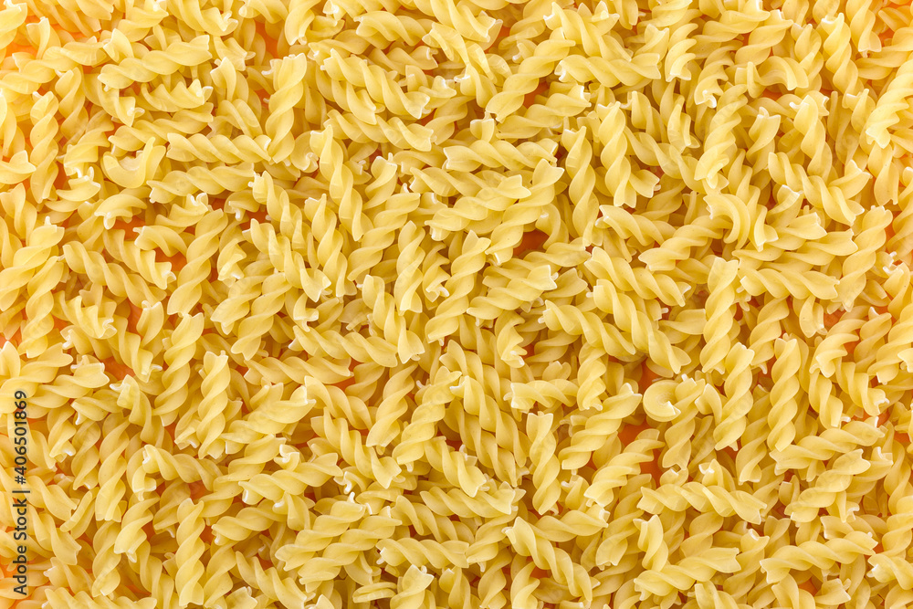 Many spiral shaped pasta as background, texture, pattern. Many spiral shaped pasta as background, texture, pattern.