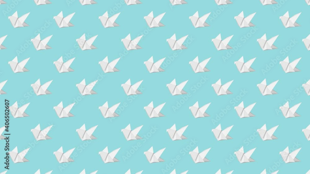 Paper origami birds on a pale blue background. Simple seamless loop animated pattern Paper origami birds on a pale blue background. Simple seamless loop animated pattern
