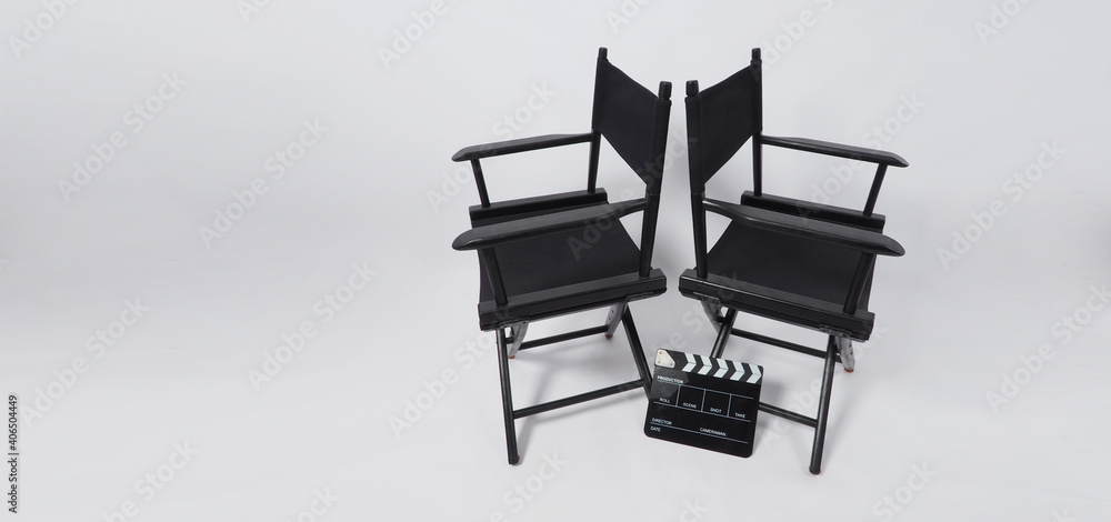 Two black director chair and clapper board use in video production or movie and cinema industry on white background.