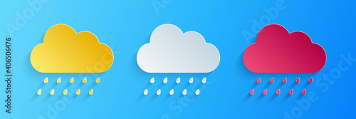 Paper cut Cloud with rain icon isolated on blue background. Rain nimbus cloud precipitation with rain drops. Paper art style. Vector.
