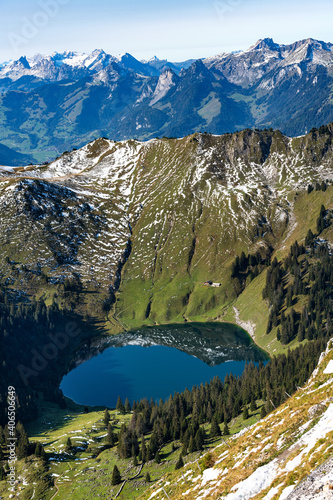 .A mountain lake with reflection of a mountain ridge.
