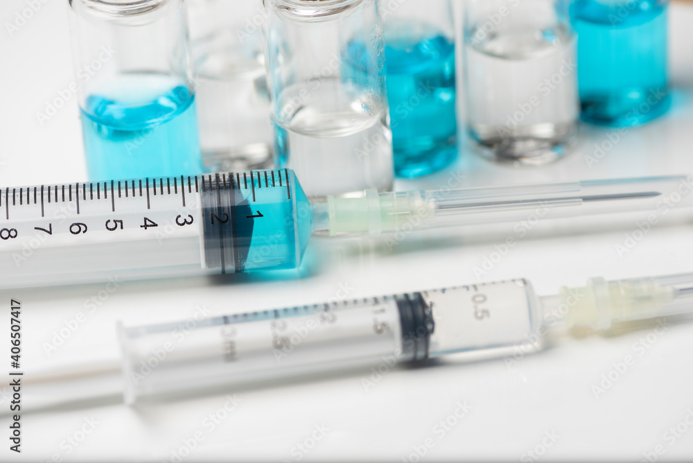 Nobel coronavirus covid-19 vaccine vial a illustrative picture, doctor in the laboratory with a biological tube for analysis and sampling of Covid-19 infectious disea. Nobel coronavirus covid-19 vaccine vial a illustrative picture, doctor in the laboratory with a biological tube for analysis and sampling of Covid-19 infectious disea.
