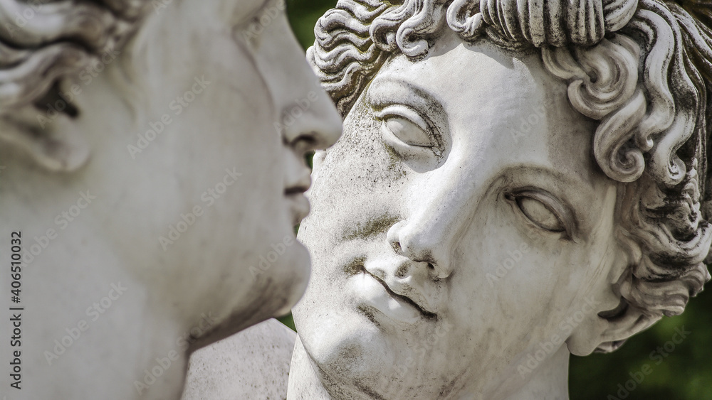 Old statue of beautiful Nymphs in love at Rosenstein city park in Stuttgart, Germany, closeup, details. Concept of love, care and dating