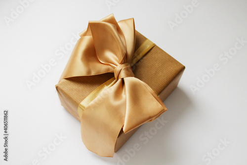 Christmas gift in craft paper isolated at white background. Gift box.