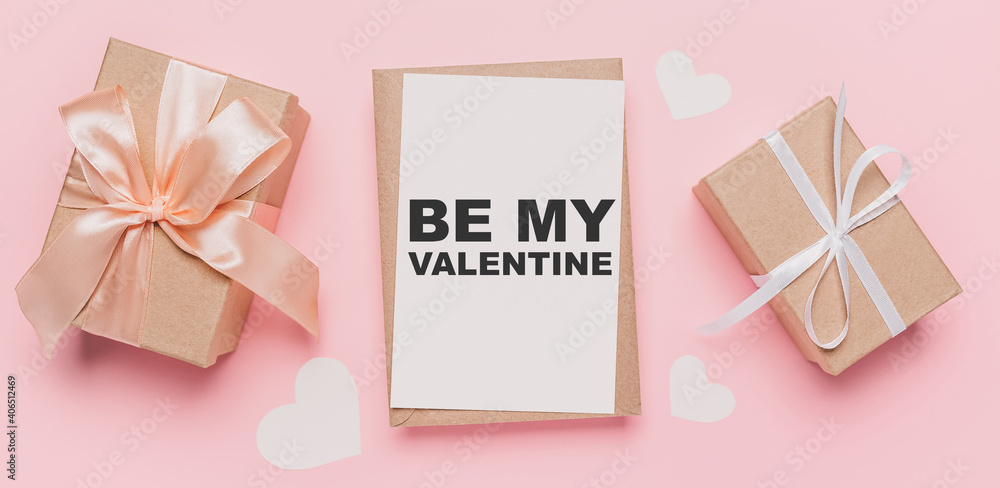 Gifts with note letter on isolated pink background, love and valentine concept with text be my Valentine