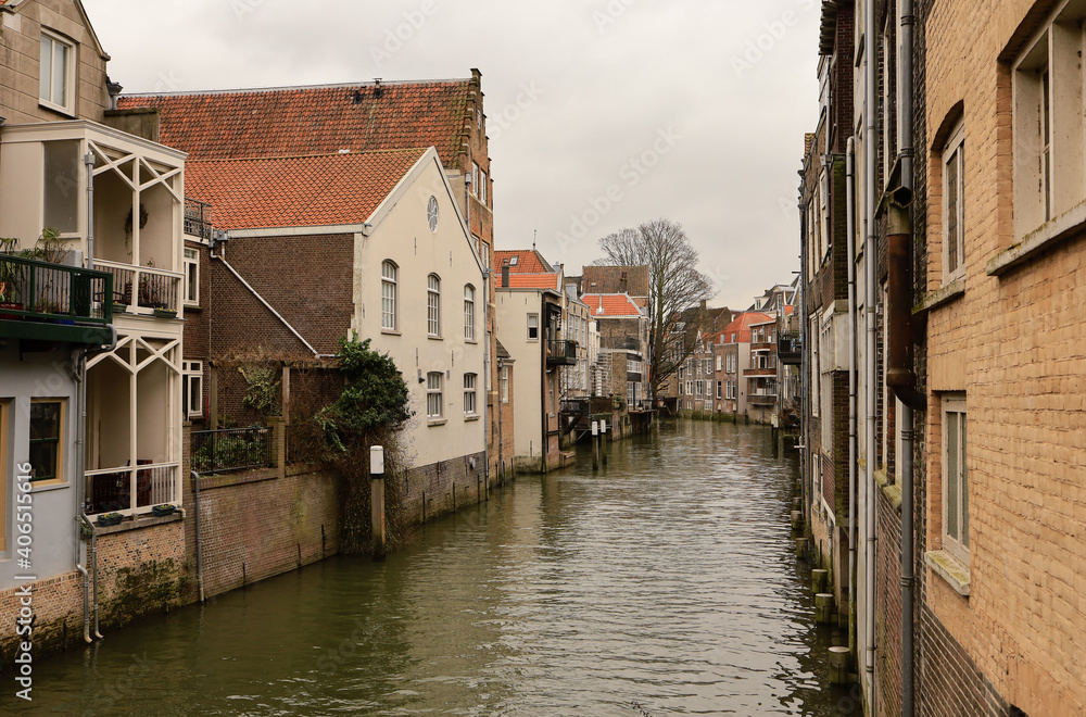 canal lined with houses in the medieval town centre of Dordrecht, the Netherlands