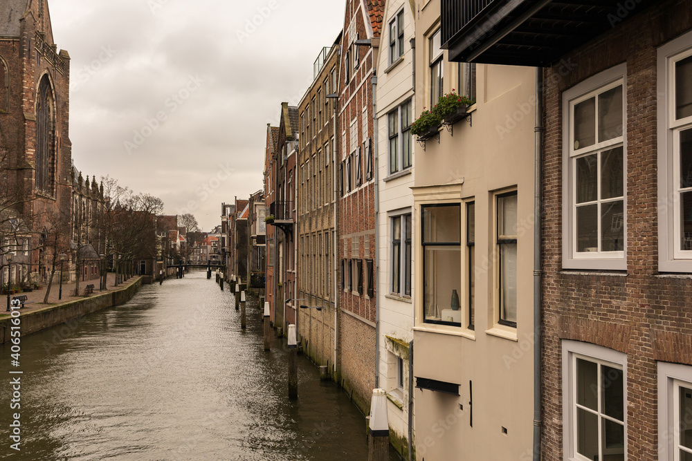 canal lined with houses in the medieval town centre of Dordrecht, the Netherlands