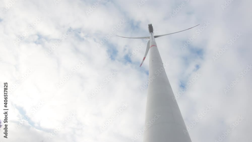 Windmill frog's-eye view future of energy production 4k Windmill frog's-eye view future of energy production 4k