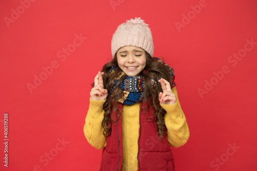 teen child in puffer waistcoat and knitwear make wish. seasonal kid fashion. christmas holiday and vacation. cute beauty keep warm. weather forecast. cheerful girl ready for winter activity