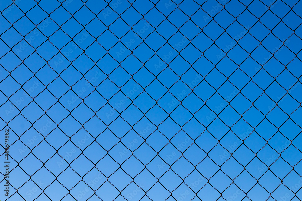 Fondo Valla de alambre contra el cielo azul Fondo Valla de alambre contra el cielo azul