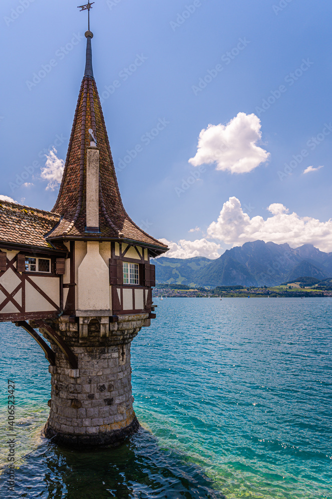Water tower of the Oberhofen castle on the shore of Lake Thun in municipality Oberhofen, canton Bern, Switzerland