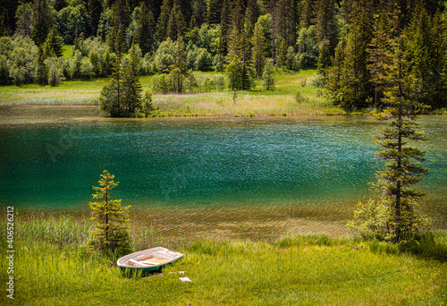 Blue lake Lauenen in the Louwene Valley, Switzerland photo