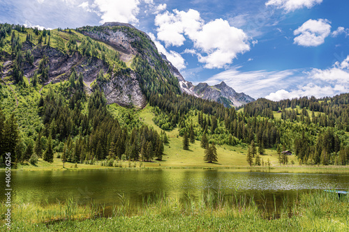 Landscape around the Lake Lauenen in the Louwene Valley of canton Bern, Switzerland photo