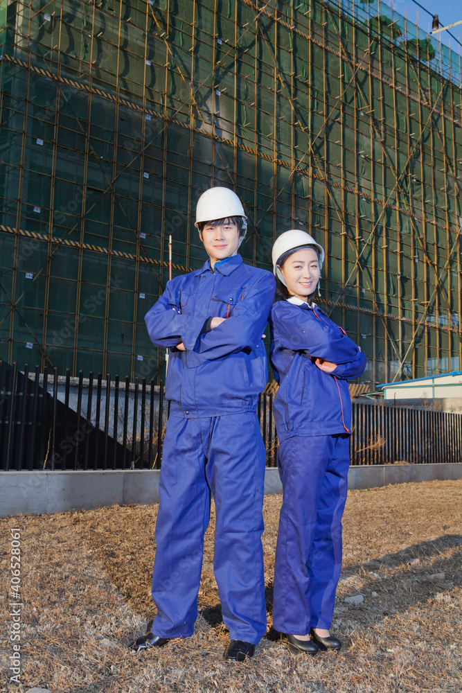 The Young Engineers working at construction field The Young Engineers working at construction field