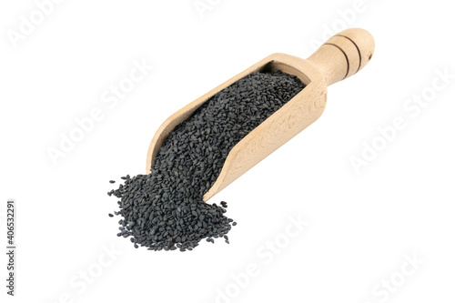 Black Sesame seeds in wooden scoop isolated on white background. Spices and food ingredients. photo