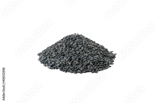 Black Sesame seeds heap isolated on white background. Spices and food ingredients.