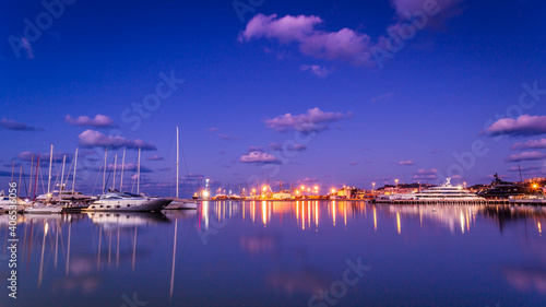 Print op canvas Barche e riflessi sull'acqua in Marina Dorica ad Ancona al tramonto