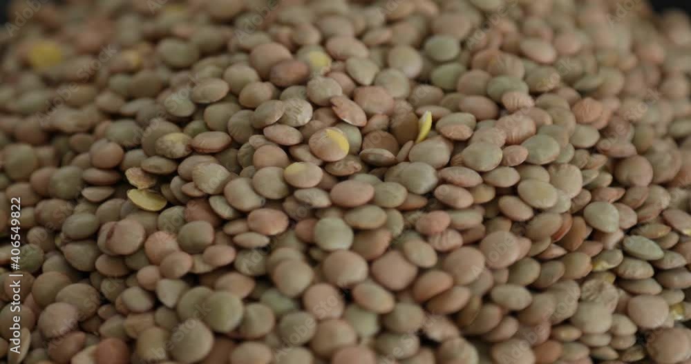 Pile of green lentils rotating Close-up shoot Pile of green lentils rotating Close-up shoot
