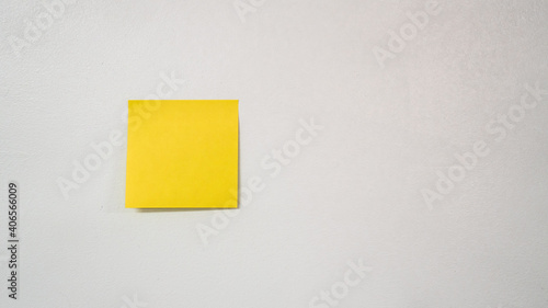 yellow sticky note on wall