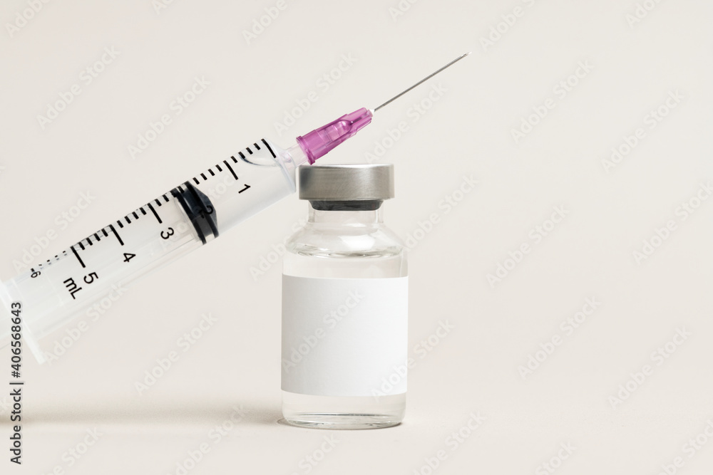 Blank white label on injection bottle glass vial with syringe Blank white label on injection bottle glass vial with syringe