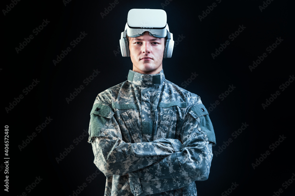 Soldier in VR headset for simulation training military technology black background Soldier in VR headset for simulation training military technology black background