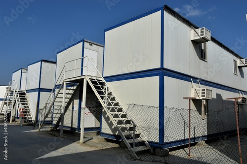 Portacabin, porta cabin, temporary labors camp , Mobile building in industrial site or office container Portable house and office cabins. Labor Camp. Porta cabin. small temporary houses © KG