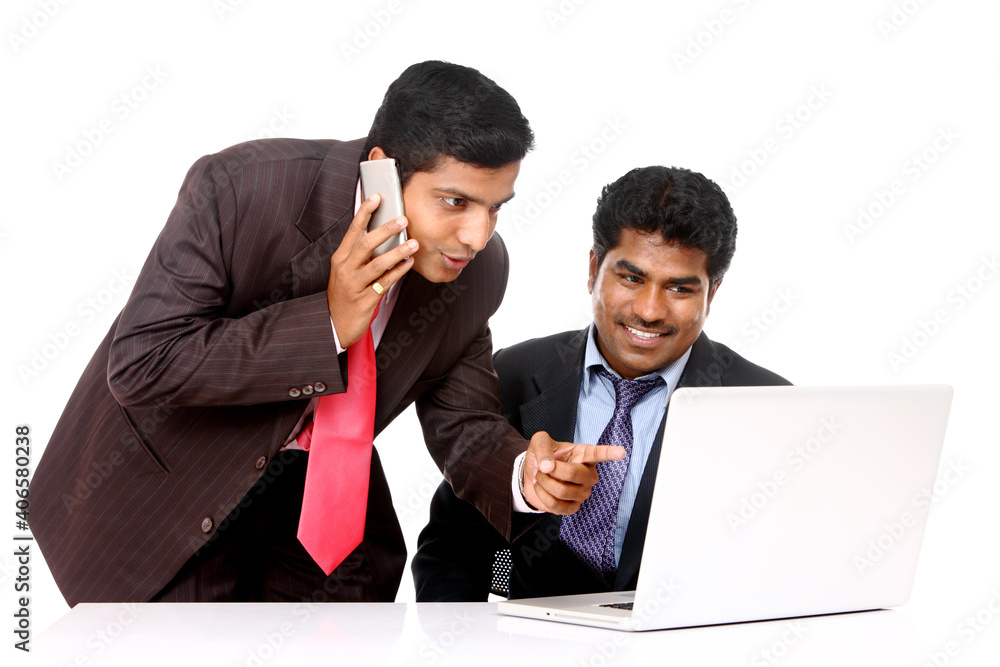 A Successful Indian business people working at office. A Successful Indian business people working at office.