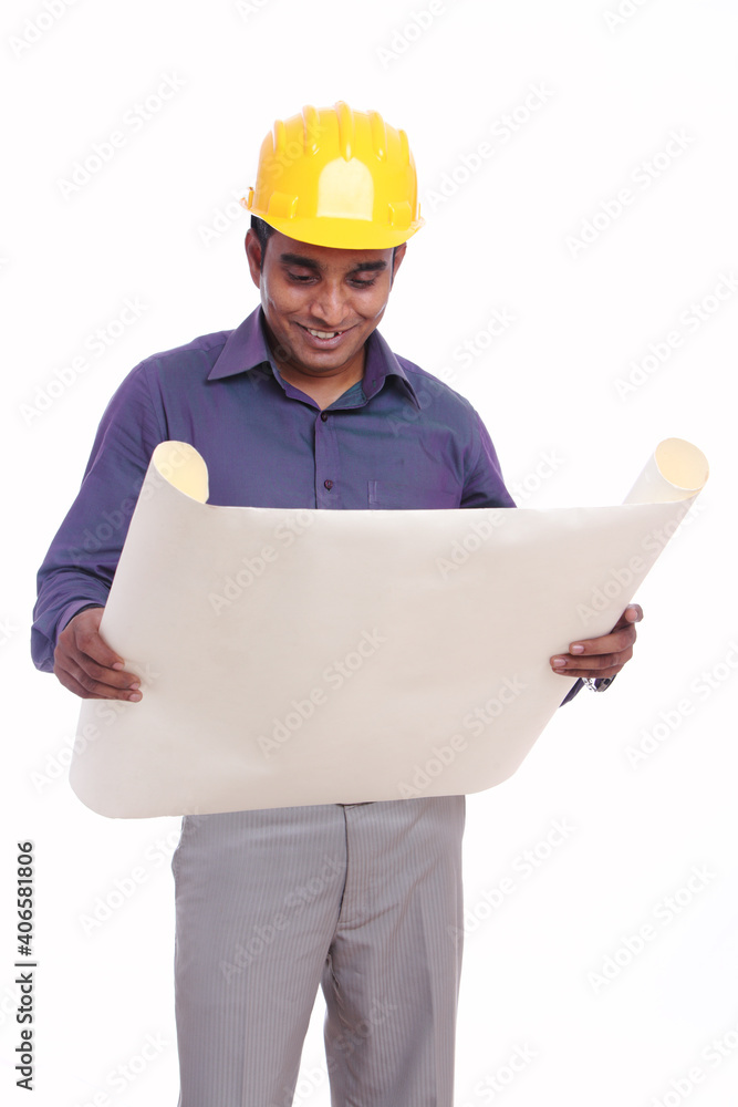 Young indian architect posing to the camera Young indian architect posing to the camera