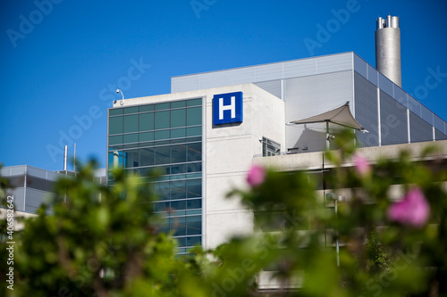 Modern hospital and sign