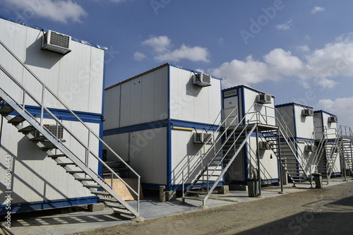 Portacabin, porta cabin, temporary labours camp , Mobile building in industrial site or office container Portable house and office cabins. Labor Camp. Porta cabin. small temporary houses