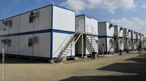 Portacabin, porta cabin, temporary labours camp , Mobile building in industrial site or office container Portable house and office cabins. Labor Camp. Porta cabin. small temporary houses © KG