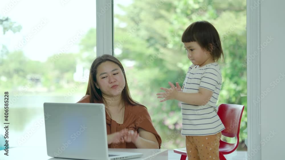 Play time, Cute little girl Pre-school learning game activities singing dancing with VDO online learning with mother beside. New normal style. Play time, Cute little girl Pre-school learning game activities singing dancing with VDO online learning with mother beside. New normal style.