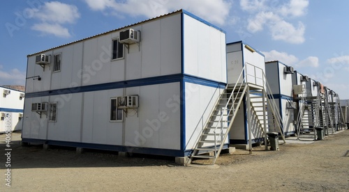 Portacabin, porta cabin, temporary labours camp , Mobile building in industrial site or office container Portable house and office cabins. Labor Camp. Porta cabin. small temporary houses