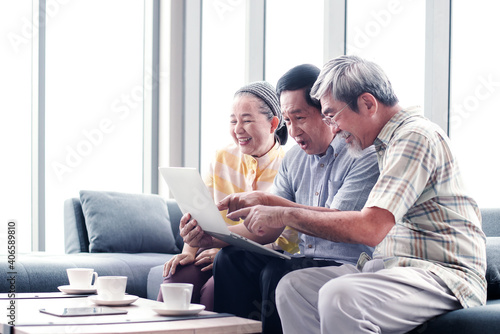 asian retired video call with their friends on mobile device