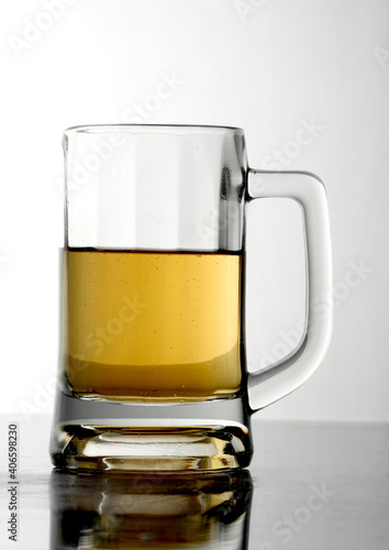 Glasses of alcohol drinks on white background.