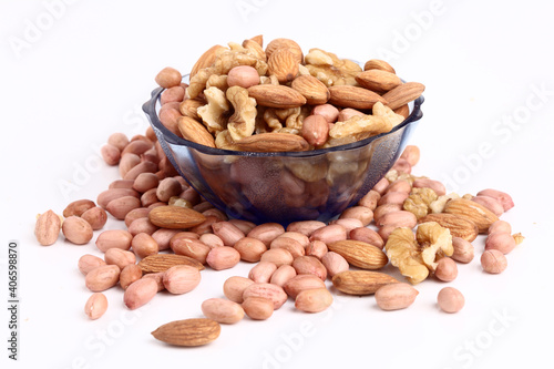 Bowl of verity Nuts Isolated on white background. photo