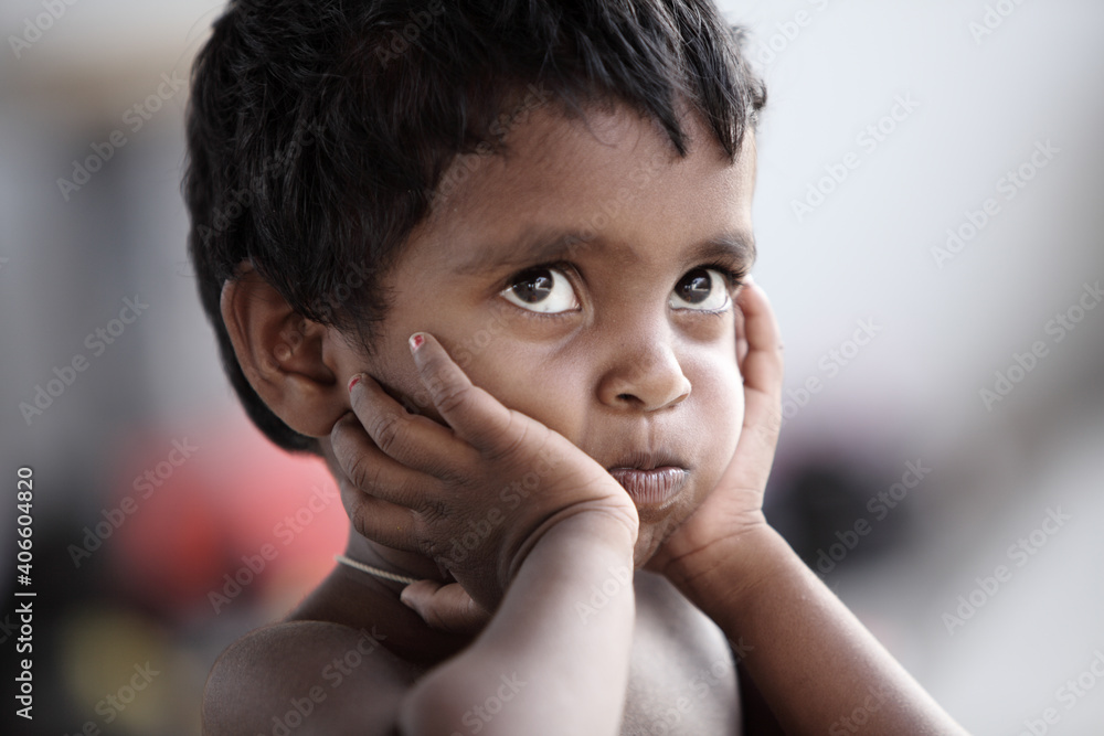 Cheerful funny little boy portrait looking at the camera. Cheerful funny little boy portrait looking at the camera.