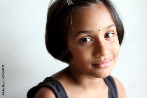 Pretty Indian funny teen girl portrait.