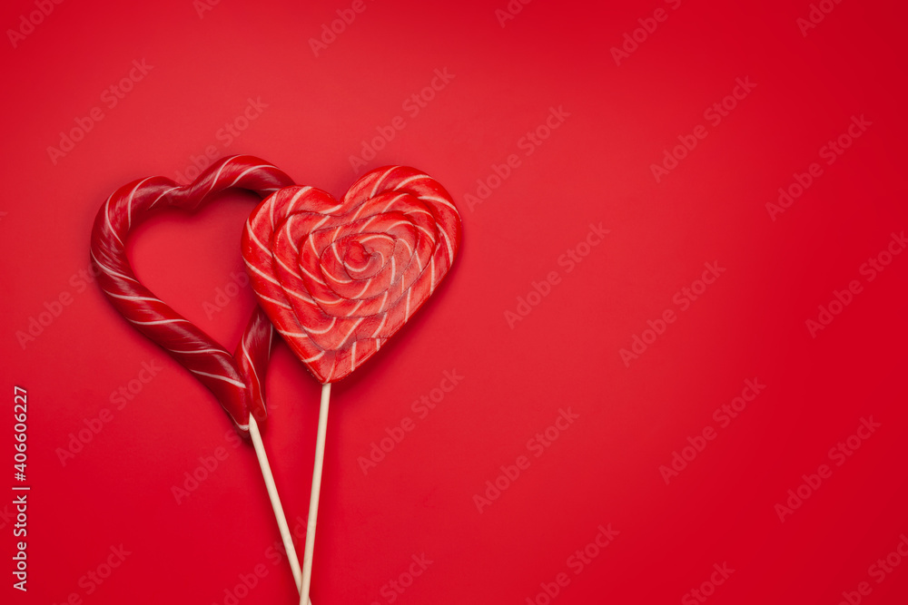 Heart candy sweets over red background