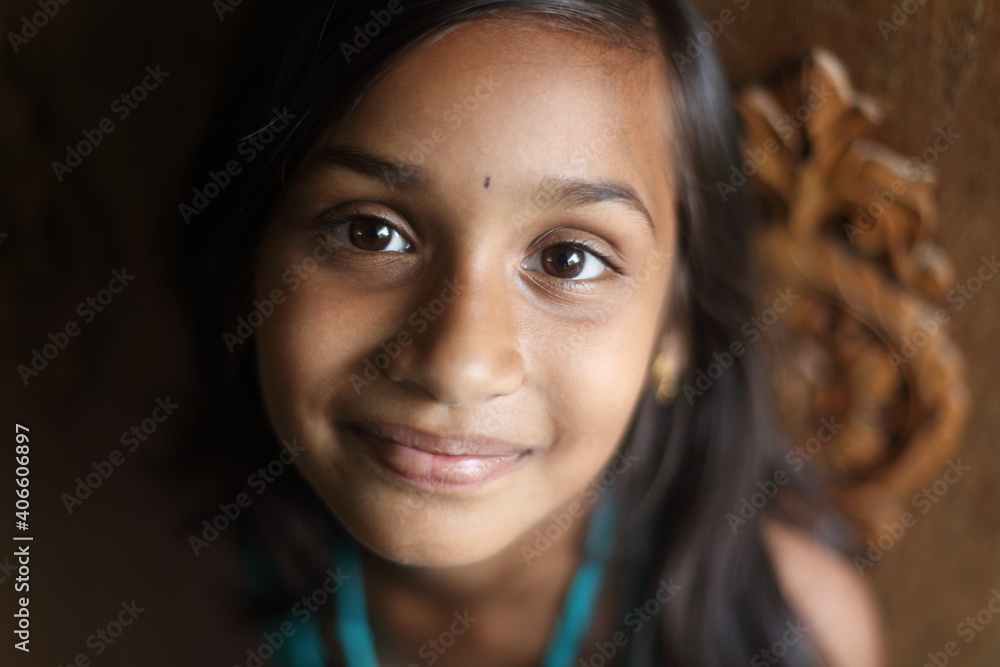 Indian beautiful teen girl posing to camera with smile Indian beautiful teen girl posing to camera with smile