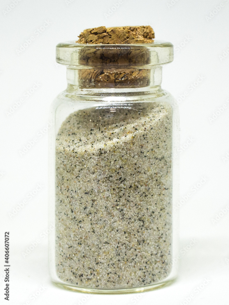 Glass jar filled with sand. Tourism, symbols for memory. Glass jar filled with sand. Tourism, symbols for memory.