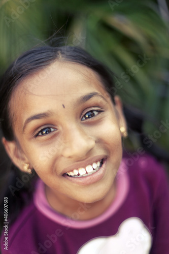 Indian beautiful teen girl posing to camera with smile