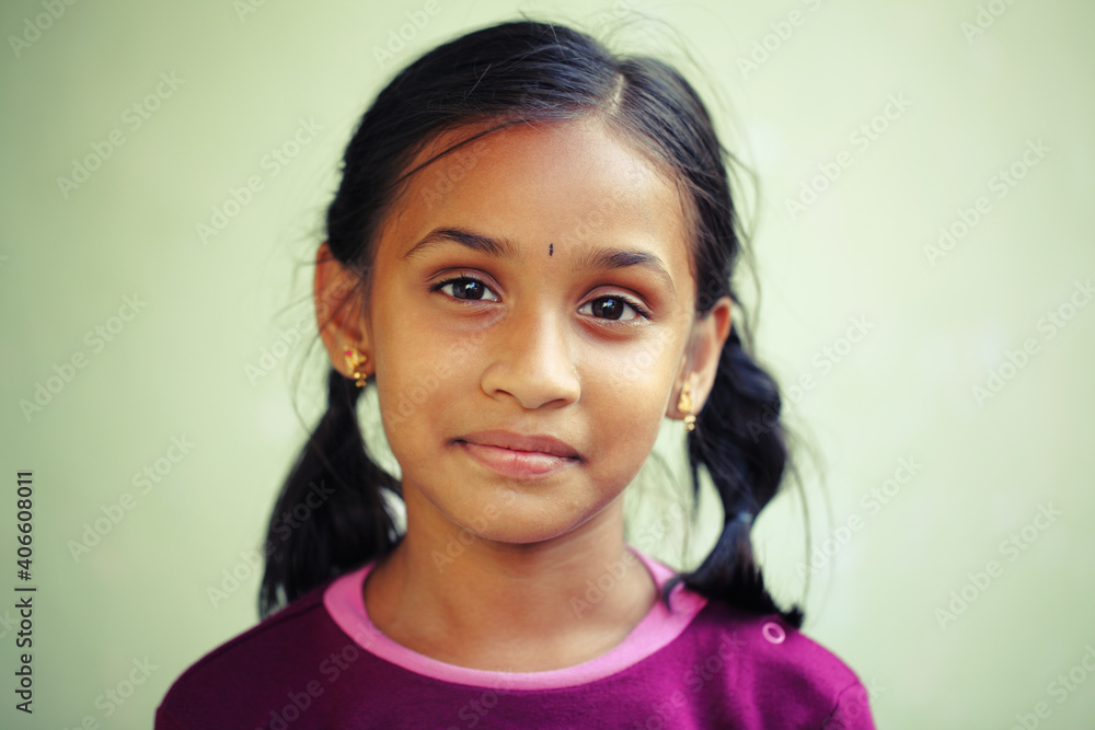 Indian beautiful teen girl posing to camera with smile Indian beautiful teen girl posing to camera with smile