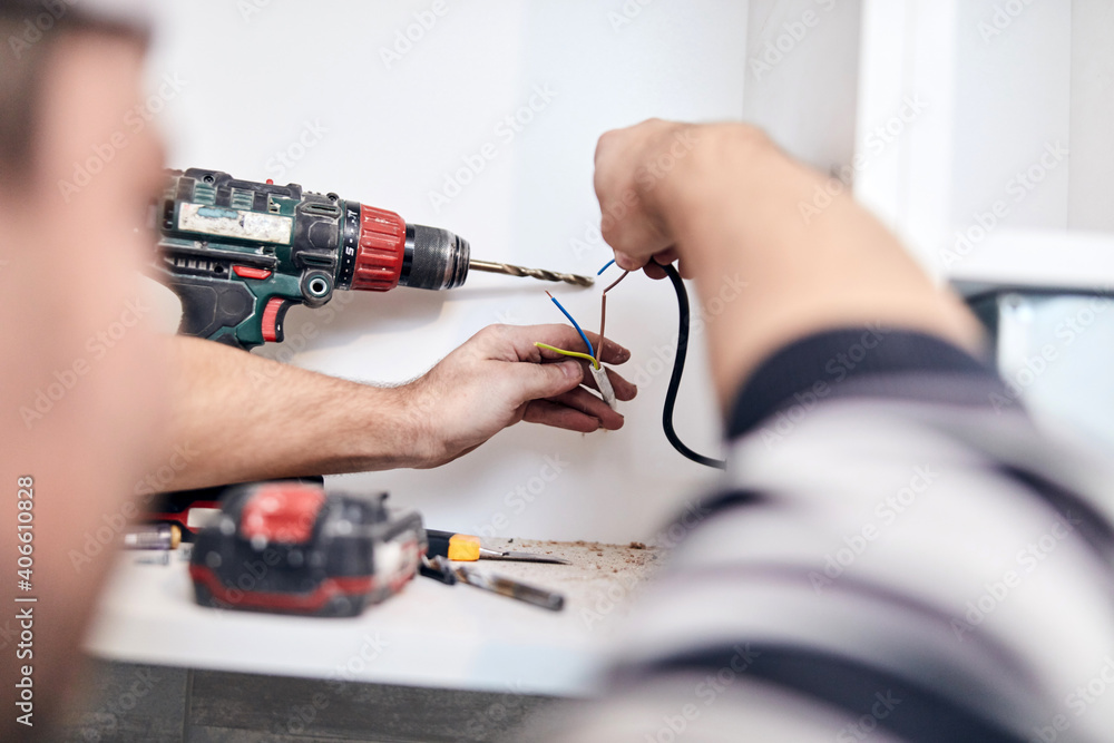 Handyman worker assembling furniture and fixing it. Handyman worker assembling furniture and fixing it.