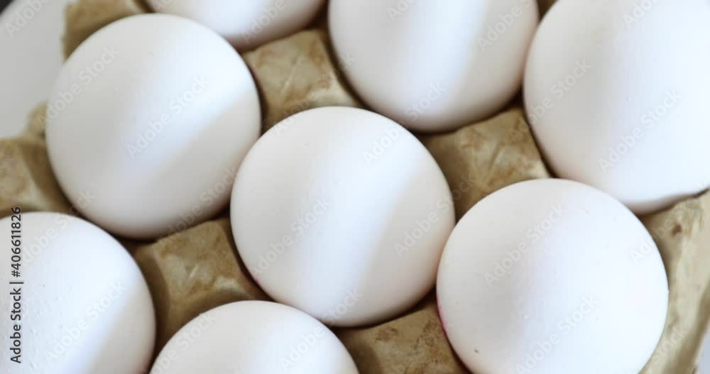 Fresh domestic chicken eggs in displayed in a container Fresh domestic chicken eggs in displayed in a container