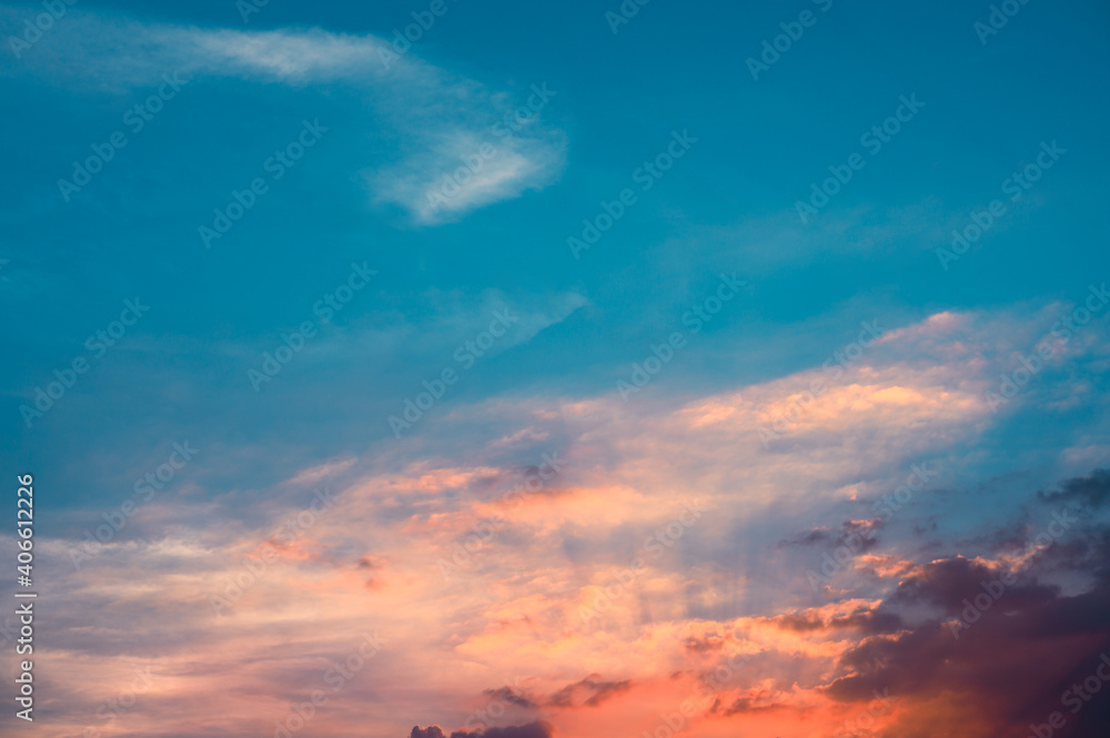 Sunbeams breaking through the clouds with blue and orange sky. Hope, prayer concept for background. Sunbeams breaking through the clouds with blue and orange sky. Hope, prayer concept for background.